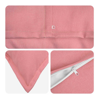 Close-up details of the pink cushion, including stitching and a zip