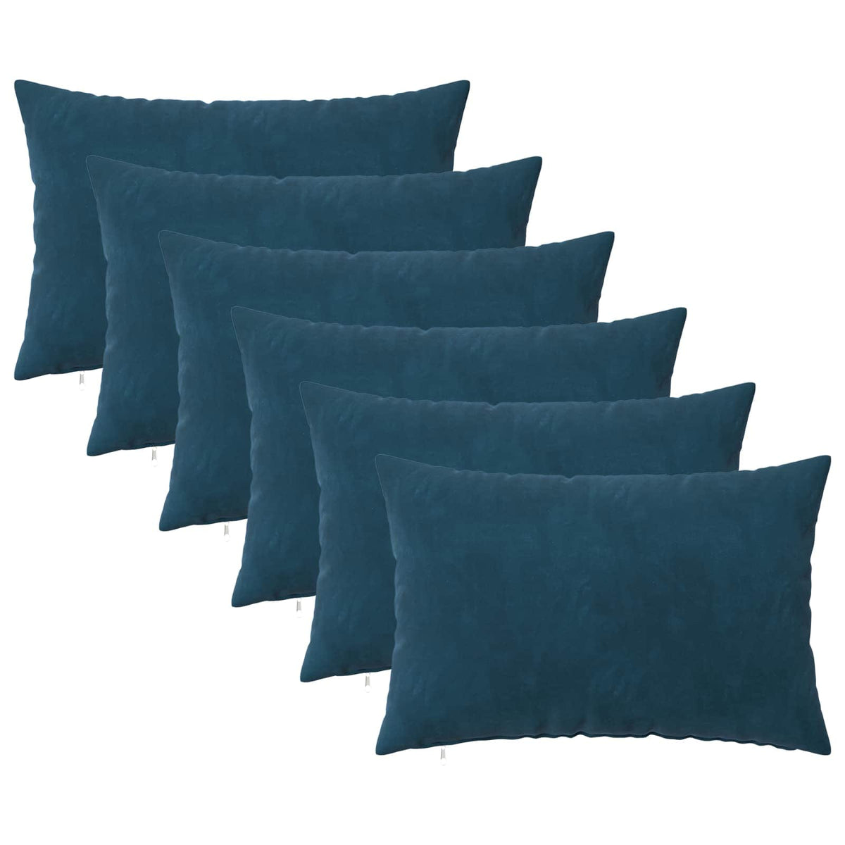 the throw pillows stacked in a row against a plain white background