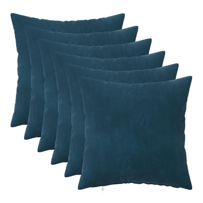 six blue velvet cushions arranged on a white background