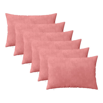 six pink velvet cushions arranged in a fan shape