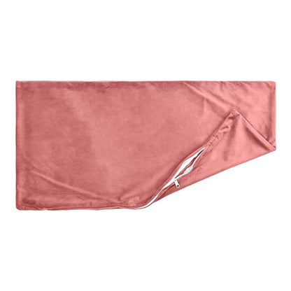 a pink velvet cushion cover with an open zip