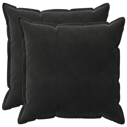 Two black velvet cushions side by side on a white background