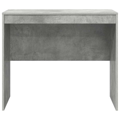 Back view of the concrete grey desk showing its simple structure