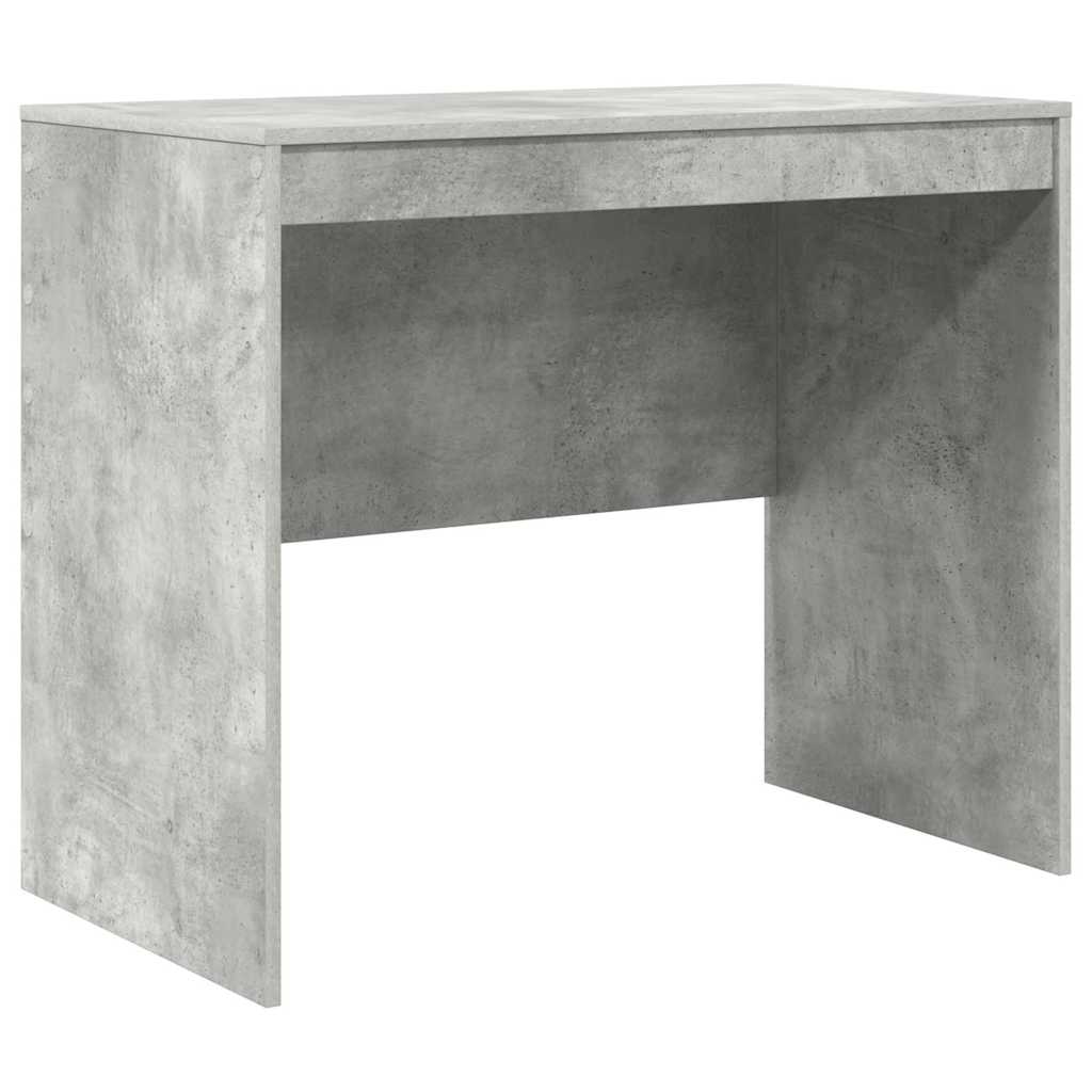 A concrete grey desk with a simple rectangular design and open leg space