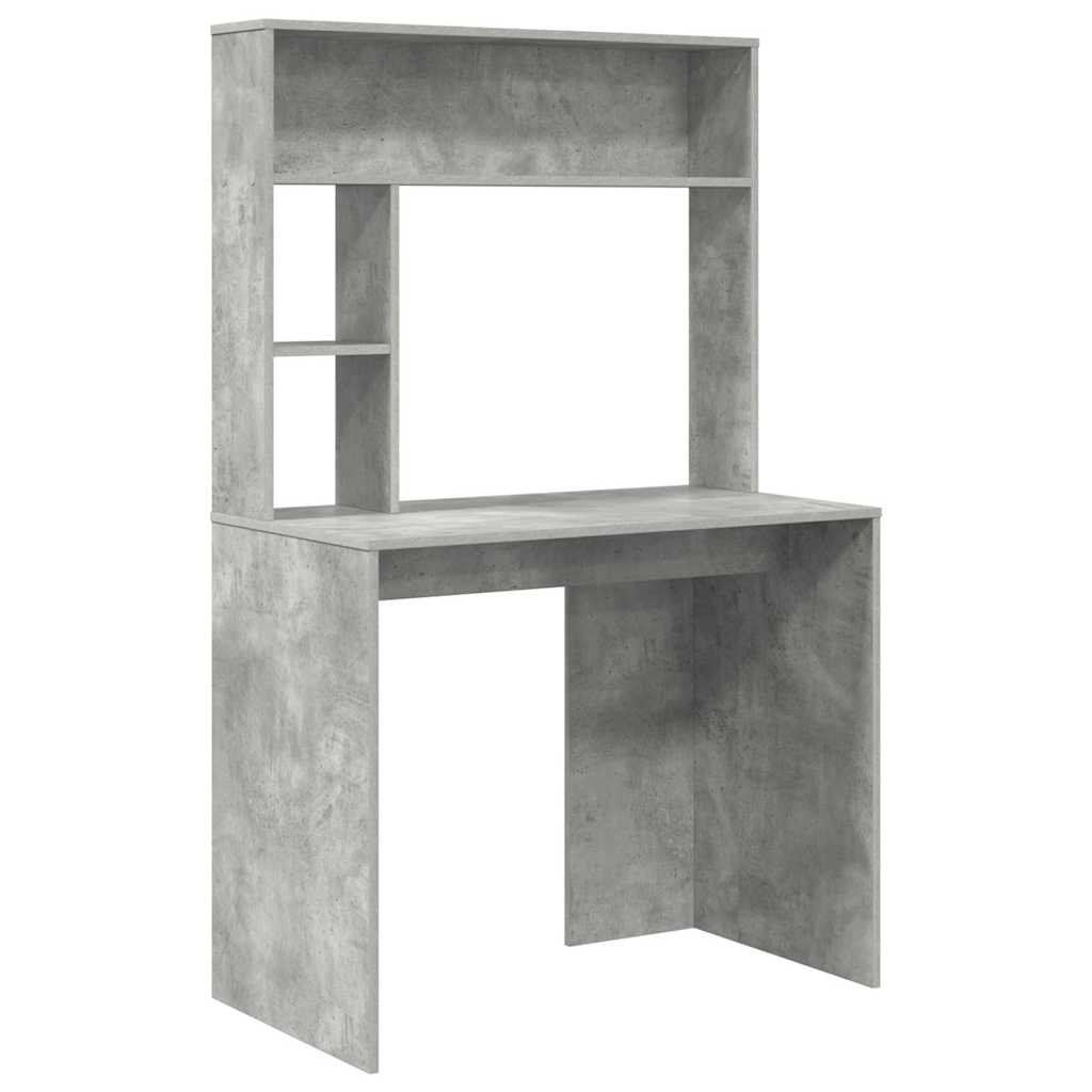 The grey desk with an integrated hutch and open shelving standing against a plain white background