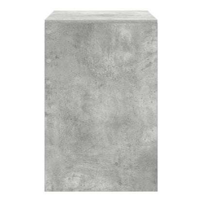 Side view of the concrete grey desk showing its textured finish