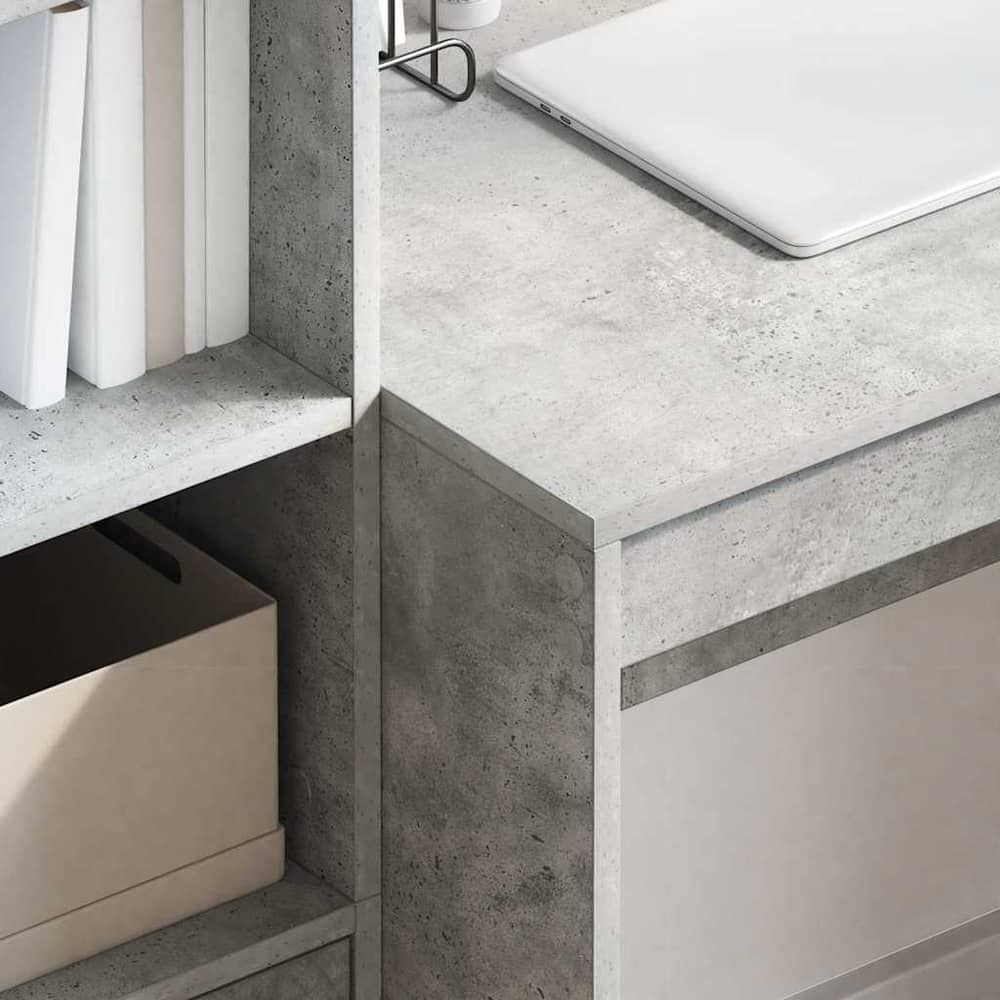 Close up of the concrete grey desk surface and a drawer detail
