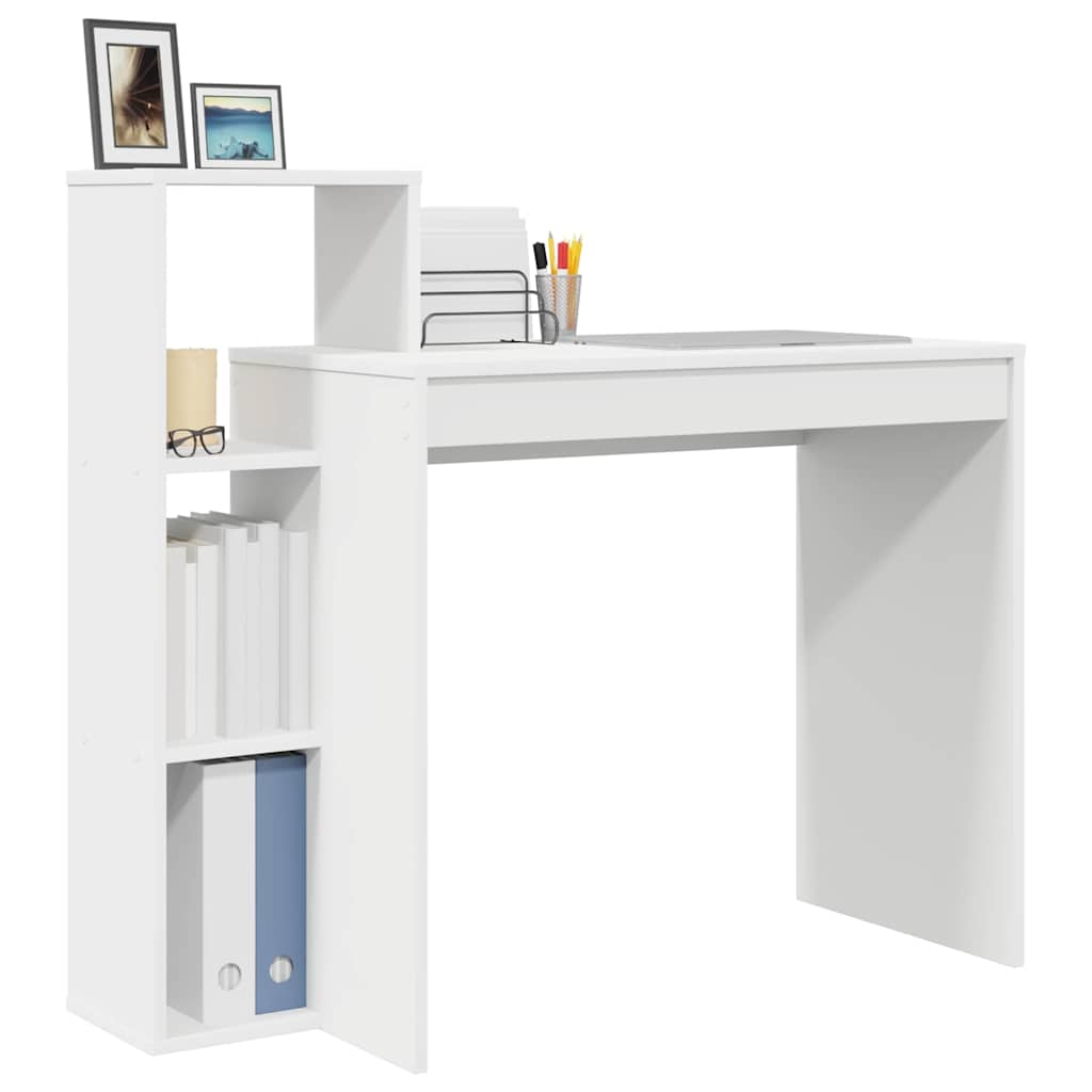 White engineered wood desk with books and photo frames on the shelves