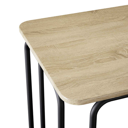 Corner of the dining table showing the rounded edge and wood grain