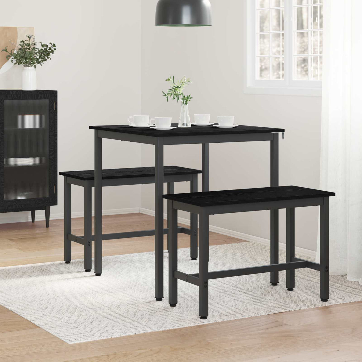 black oak square dining table and two benches arranged in a dining room setting