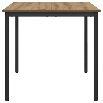 The dining table from the front showing the wood effect top