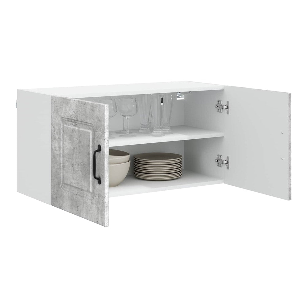 open concrete grey kitchen cabinet showing two shelves and dishes inside
