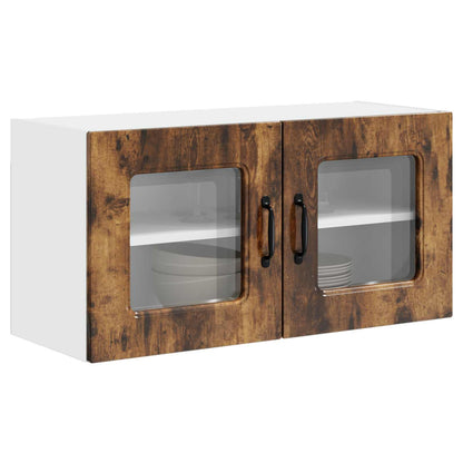 The kitchen cabinet showing plates and bowls visible through the glass door panels
