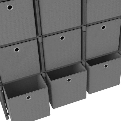 The standing shelf with three of the fabric boxes pulled out to show the open space