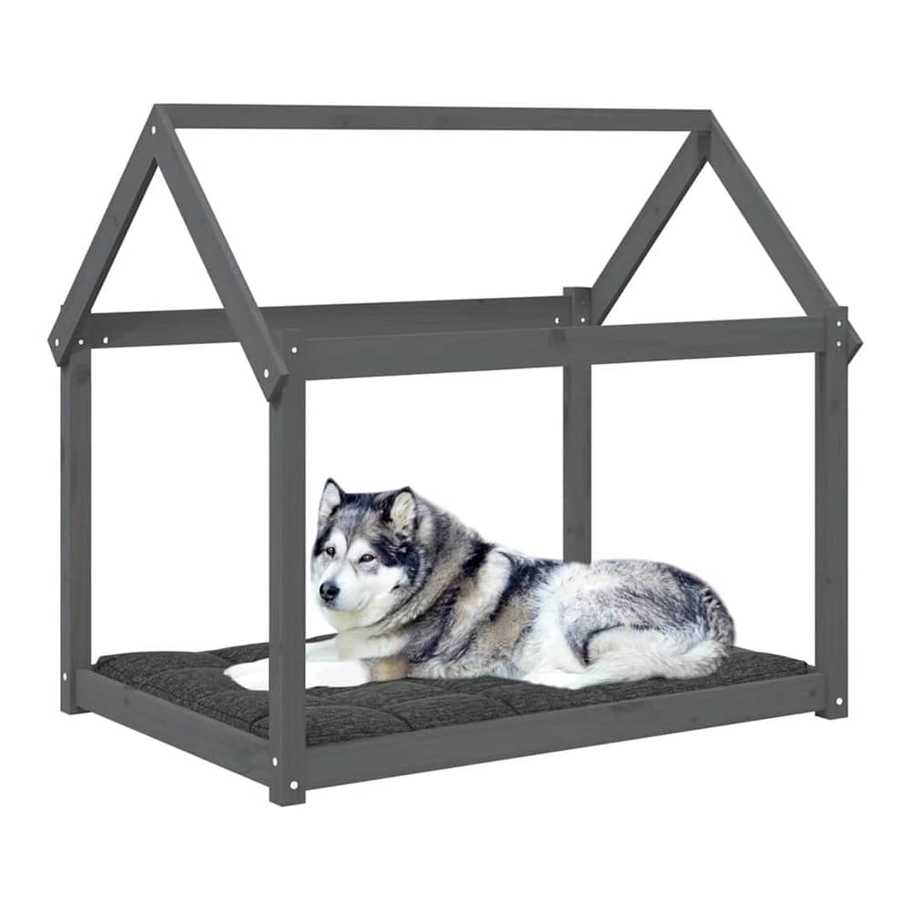 Grey solid wood pine dog bed with a dog resting on the cushion