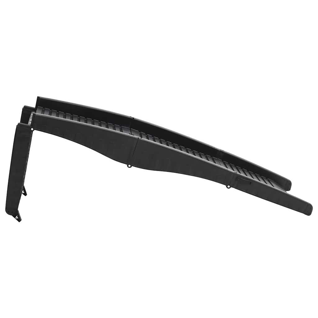 A black folding dog ramp is shown from a low side angle, extended with supports down