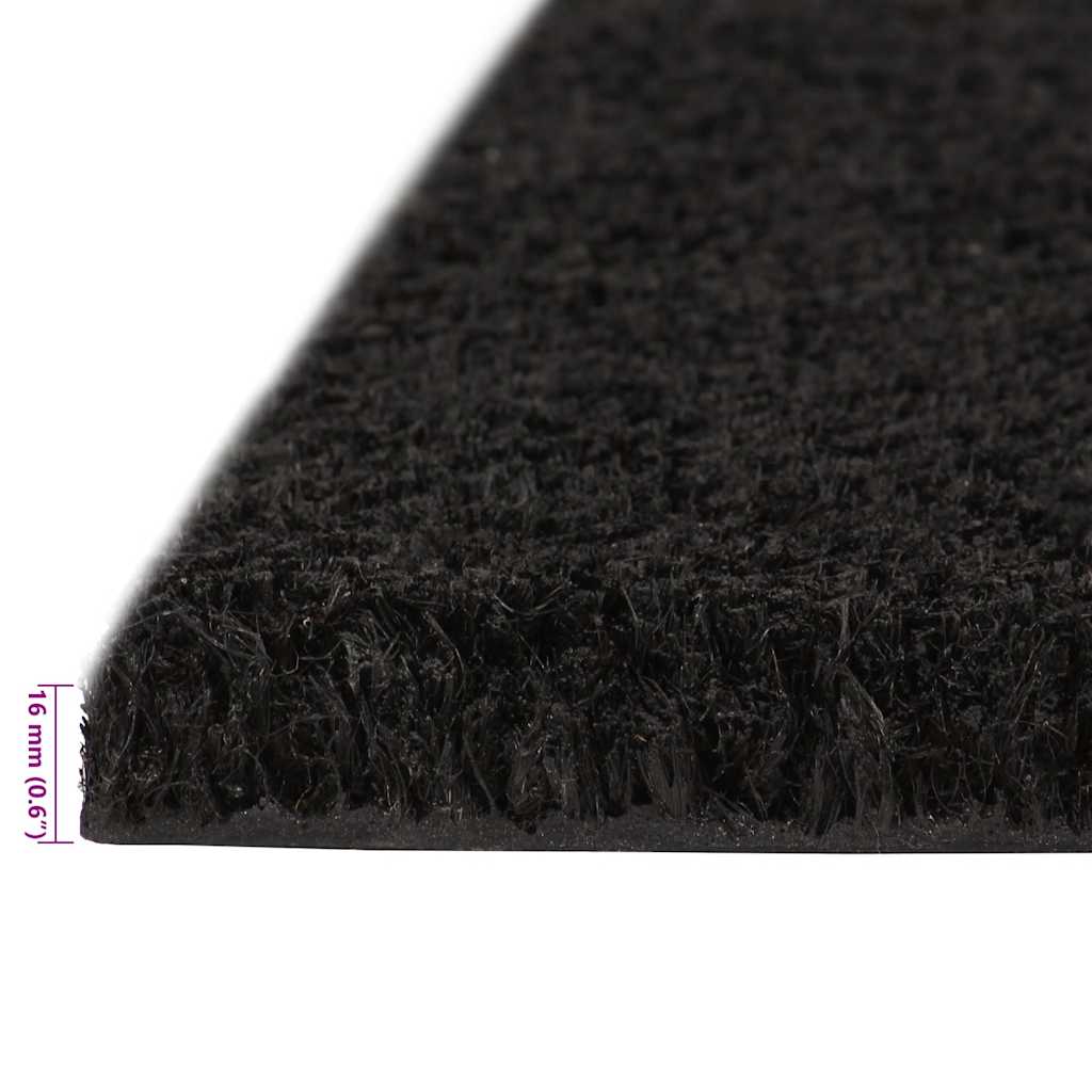 Side profile of the black tufted coir doormat showing its thickness