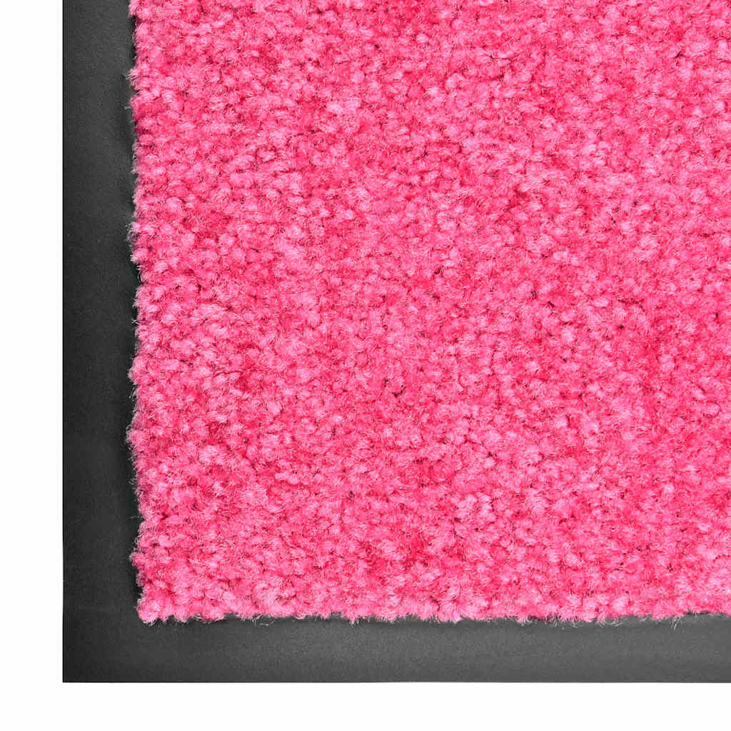 Close up of the pink doormat edge and textured surface