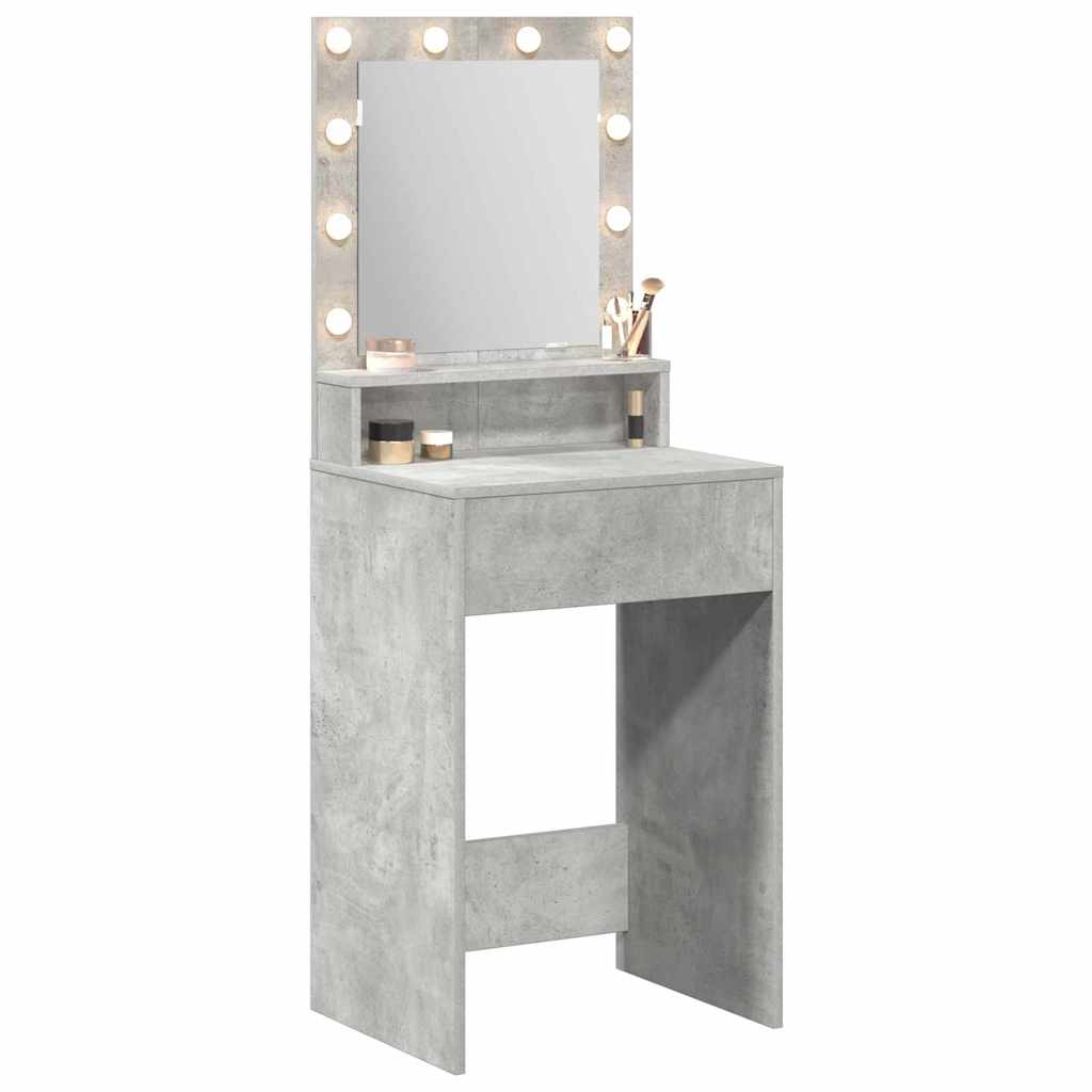 The dressing table with illuminated mirror and drawer, showing makeup items