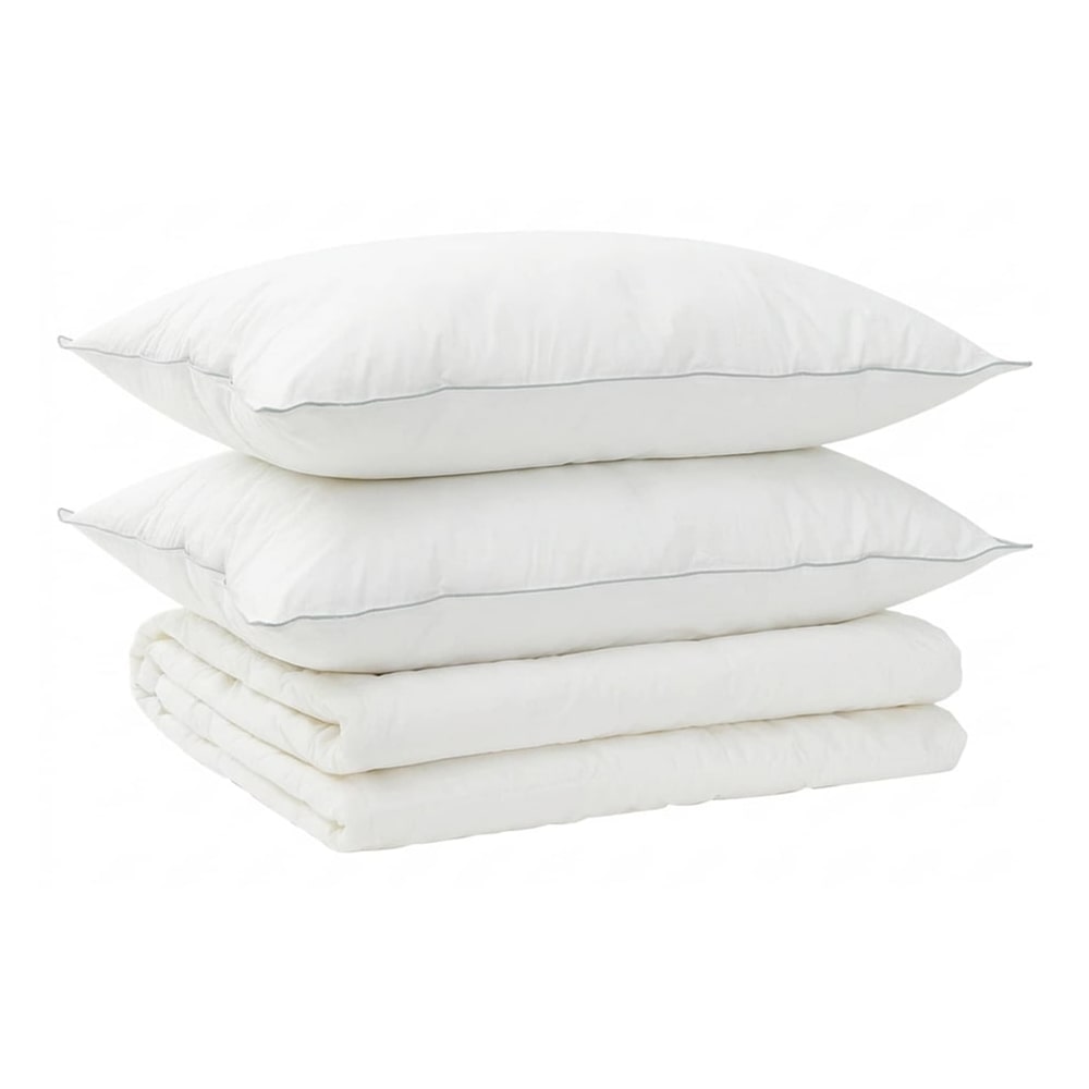 two pillows and a folded duvet