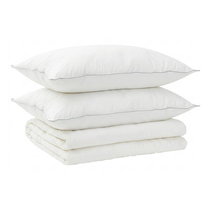 two pillows and a folded duvet