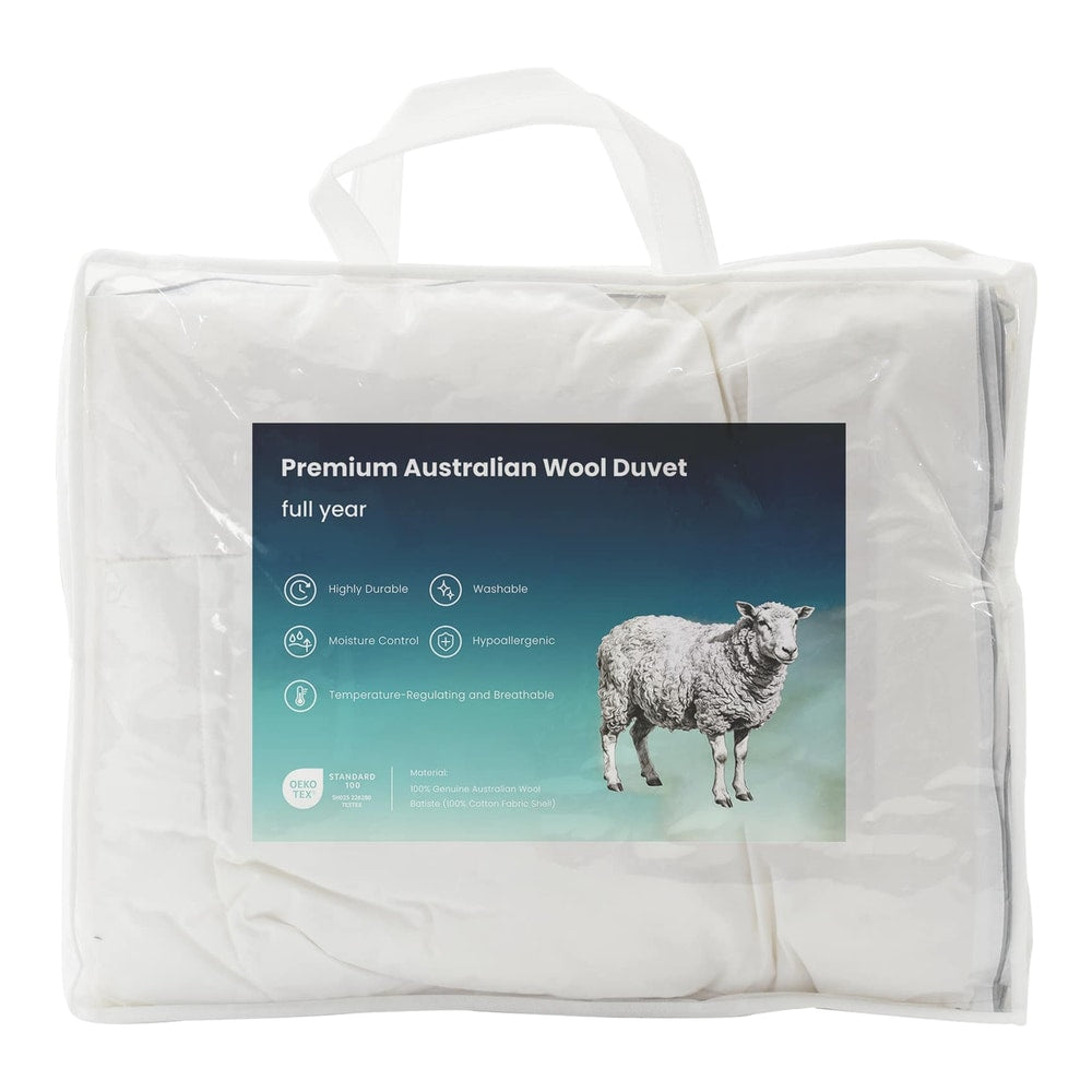 the wool duvet and pillow set inside a transparent storage bag with a product information label
