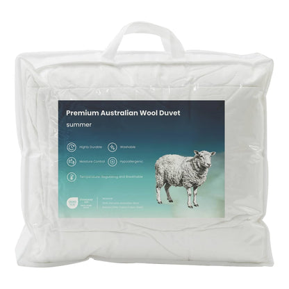 The summer duvet and pillow set in its packaging showing a sheep and product features