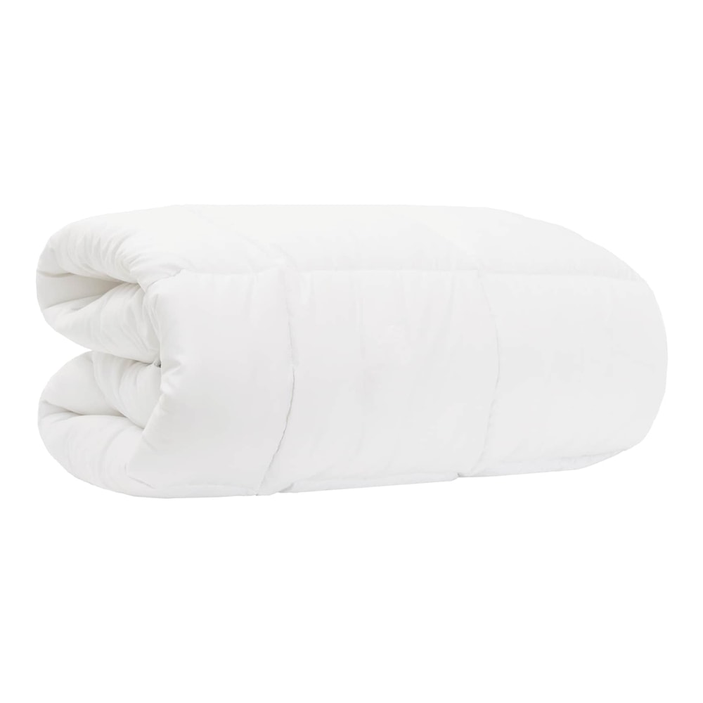 the white duvet folded into a compact rectangular shape for storage