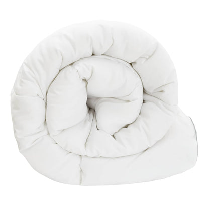 The white duvet coiled into a spiral shape on a plain background