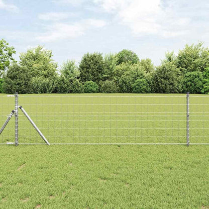 vidaXL Euro Fence PVC-coated iron set up in a grassy field with trees in the background
