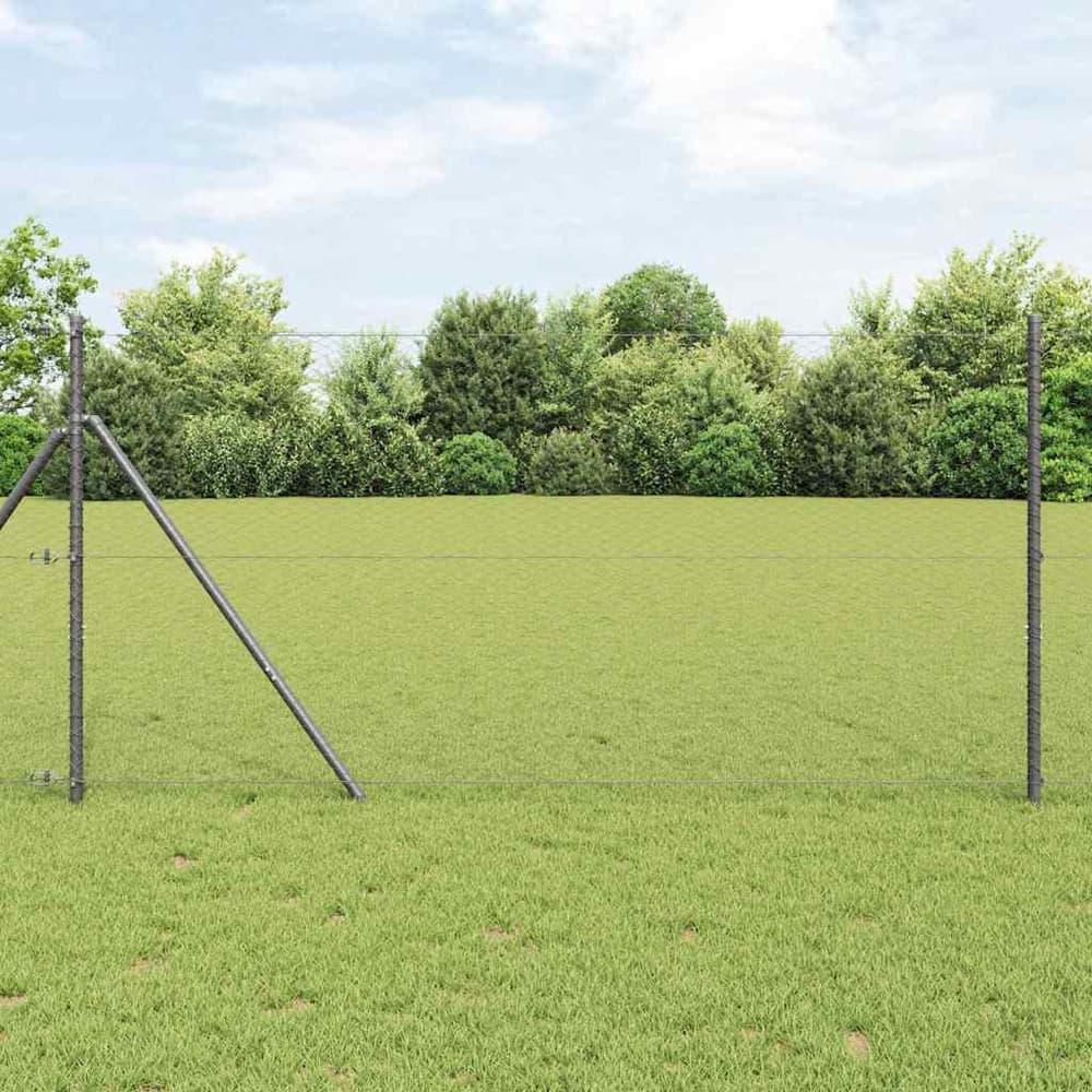 vidaXL Hexagon Fence Grey, a grey fence panel stretched between two posts in a grassy field