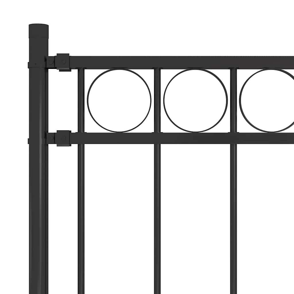 Close-up of the top corner of a black steel garden fence panel showing the decorative circle pattern