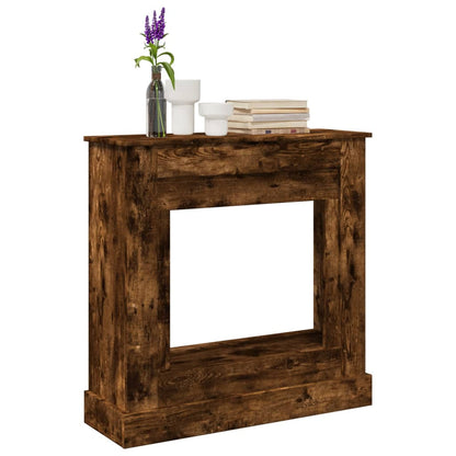 vidaXL Fireplace Surround Smoked Oak Engineered Wood decorated with a vase and books on top