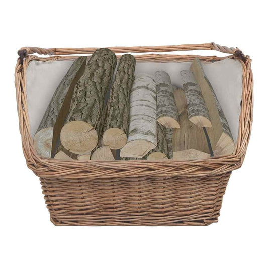 The log carrier filled with cut logs, showing its capacity and the woven willow construction