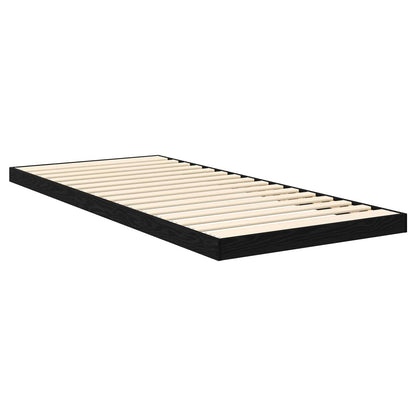 The floor bed frame with wooden slats, viewed from the side