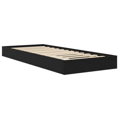 The floor bed frame showing the black oak outer structure and the light wooden slats inside