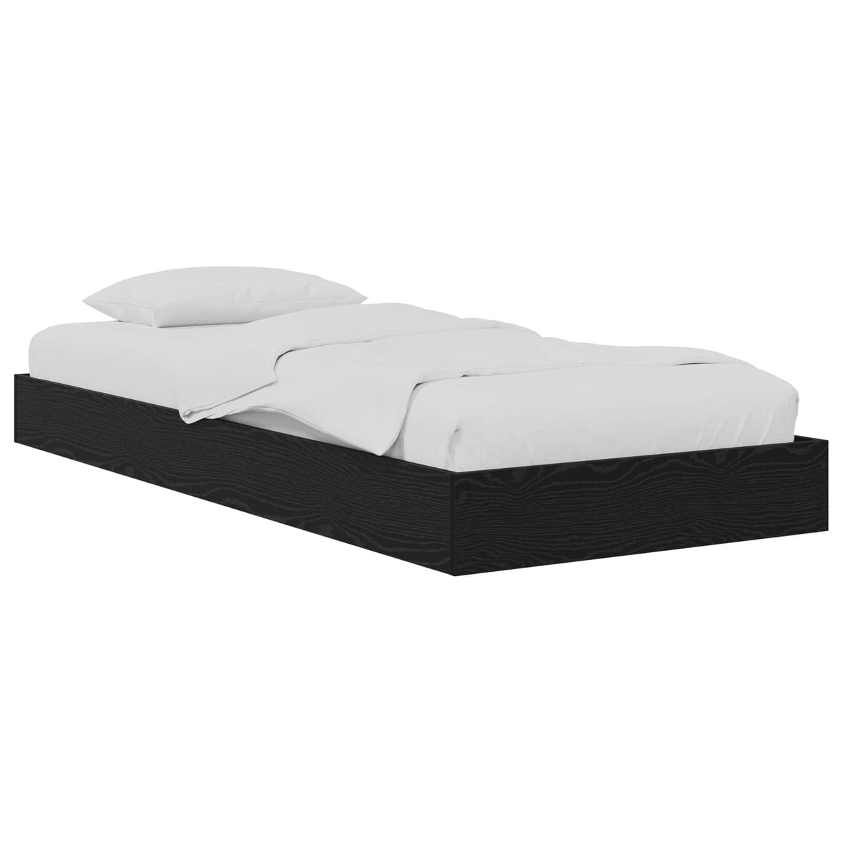 The floor bed frame in black oak with a white mattress and pillow on top against a white background