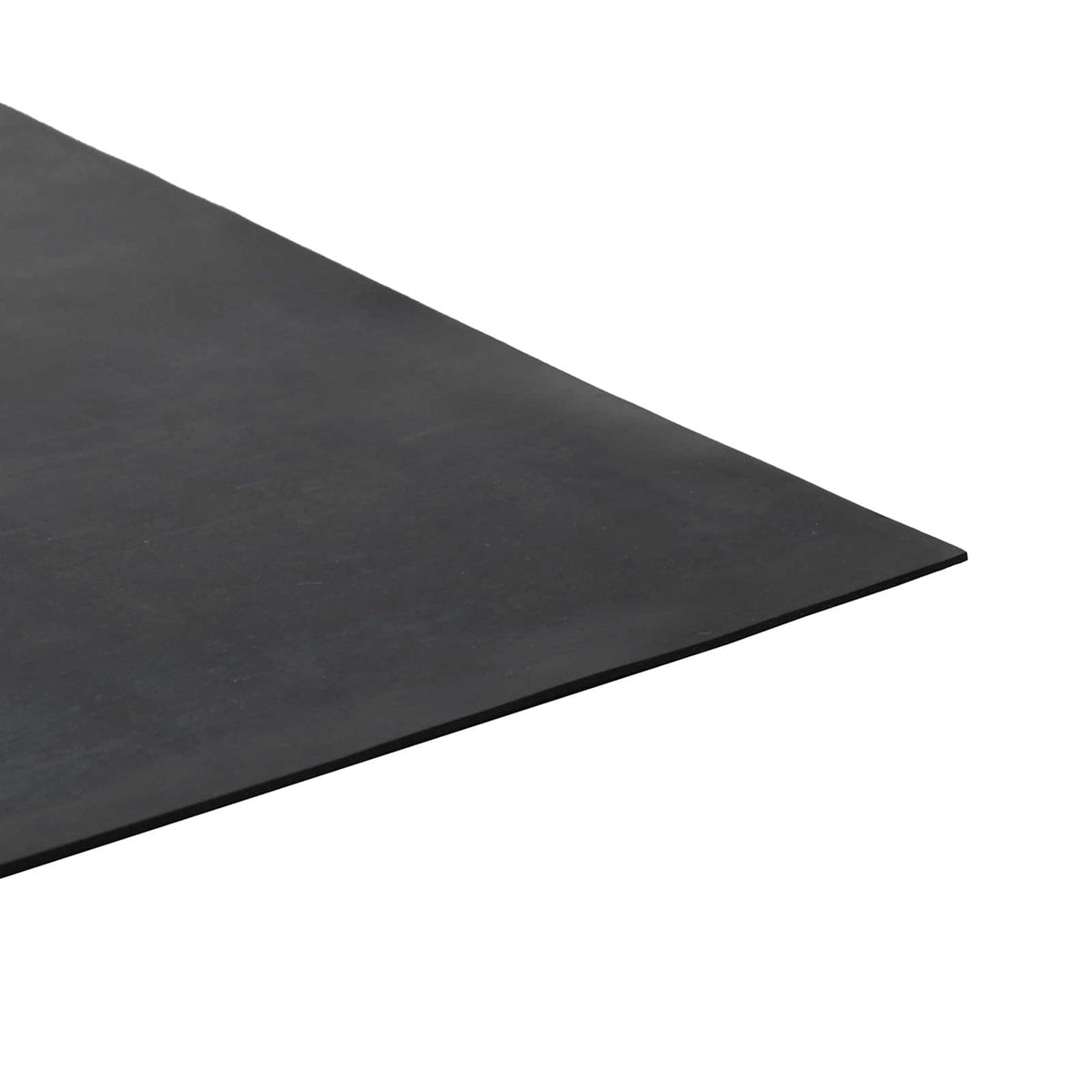 Close up of the edge of the black rubber floor mat