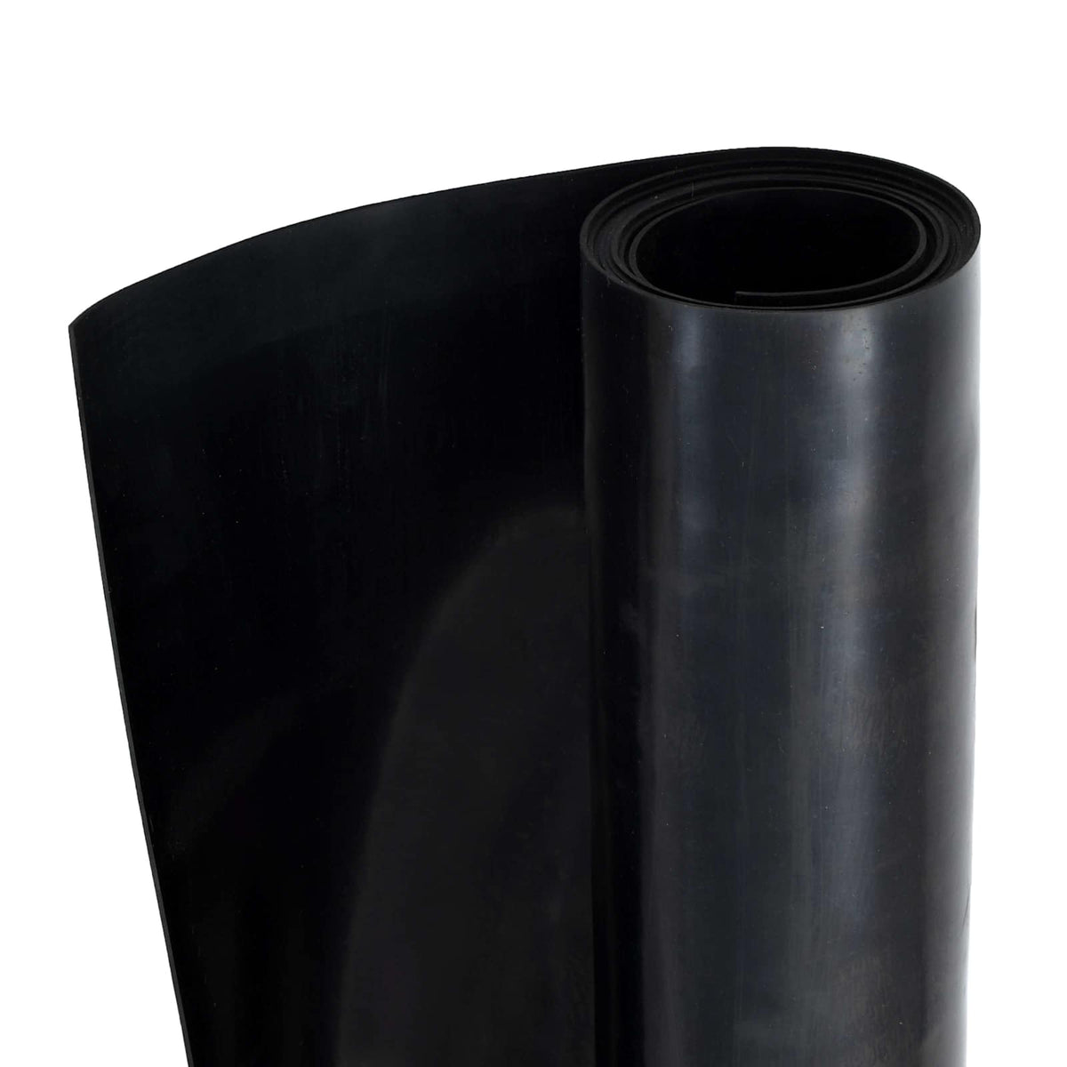 Black rubber floor mat rolled up on a white surface