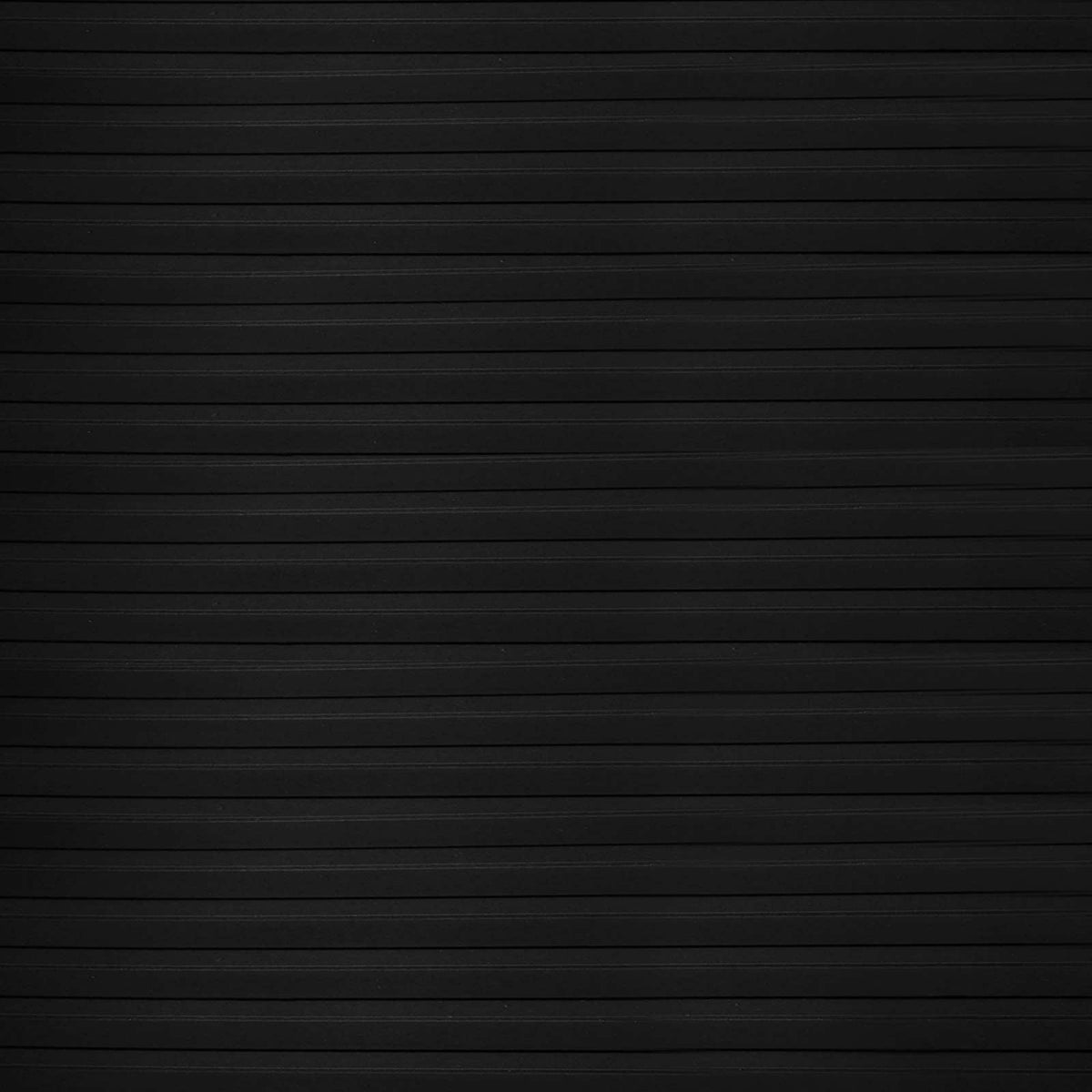 the floor mat surface showing the horizontal ribbed pattern