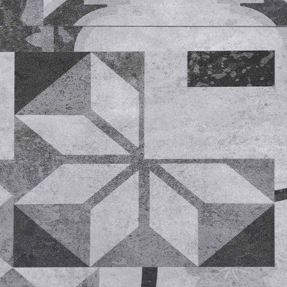 Close-up of geometric patterns on the grey self-adhesive flooring planks