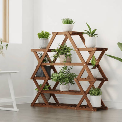 The wooden plant stand is displayed indoors with potted plants on its shelves