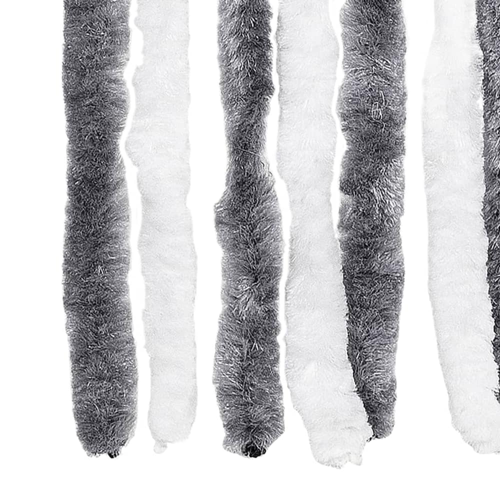 Close up of the bottom of the fly curtain showing the fluffy grey and white strands