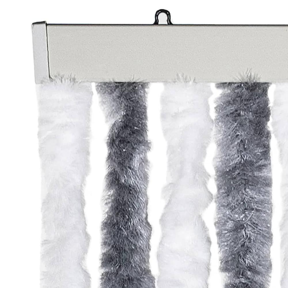 Close up of the top of the fly curtain showing the hanging mechanism and fluffy strands