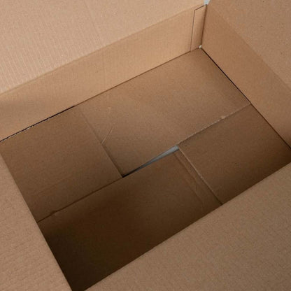 The inside of a cardboard folding box, showing the base and sides
