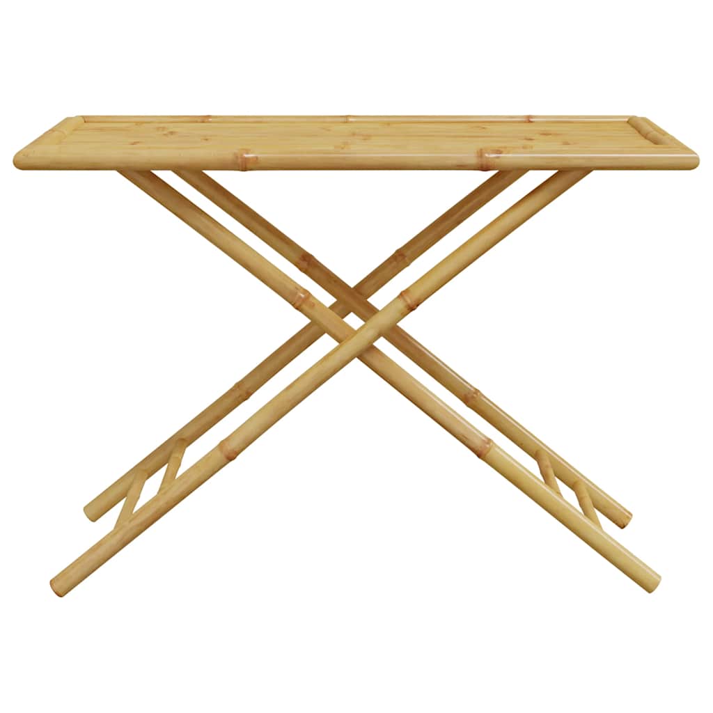 A close-up of the bamboo garden table's slatted top and X-shaped legs