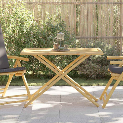 vidaXL Folding Garden Table with bamboo frame and slatted top, set up outdoors