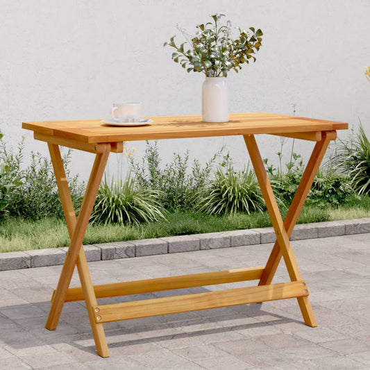 vidaXL Folding Garden Table Solid Wood Acacia set up outdoors with a cup and vase on top