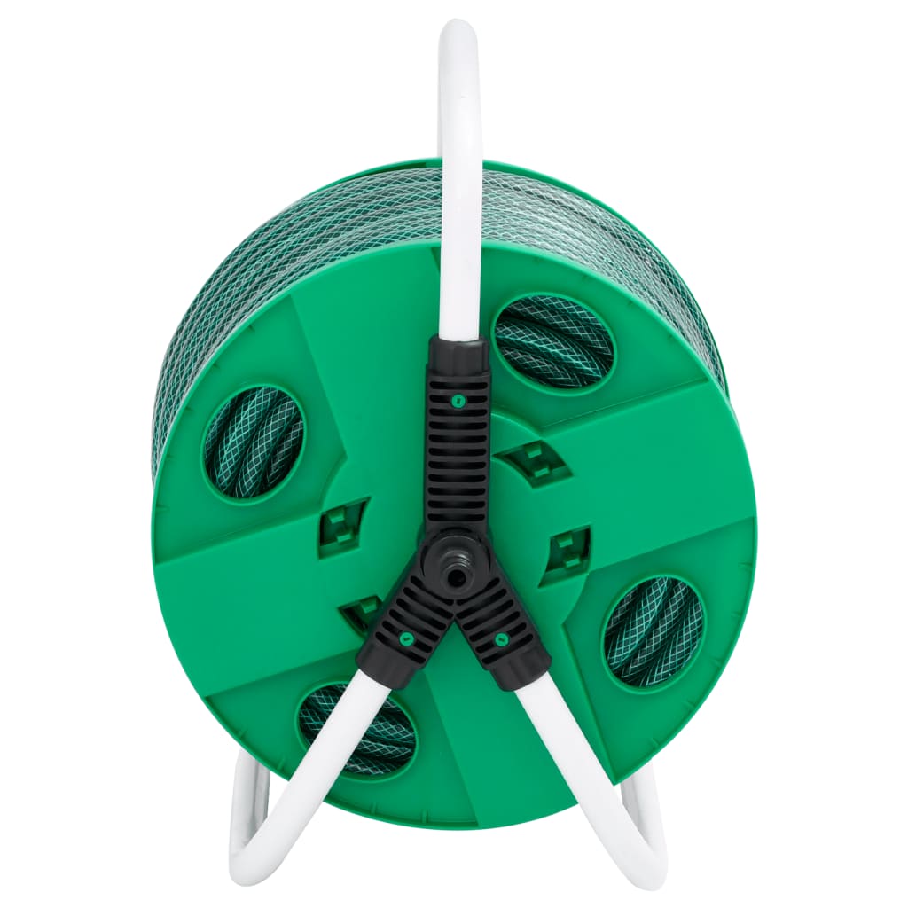 The green hose reel, showing the back of the reel with its green plastic structure and white frame