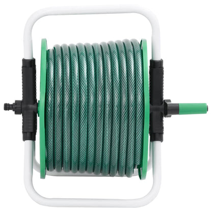 A green hose reel with a white frame, showing the coiled green hose and black fittings